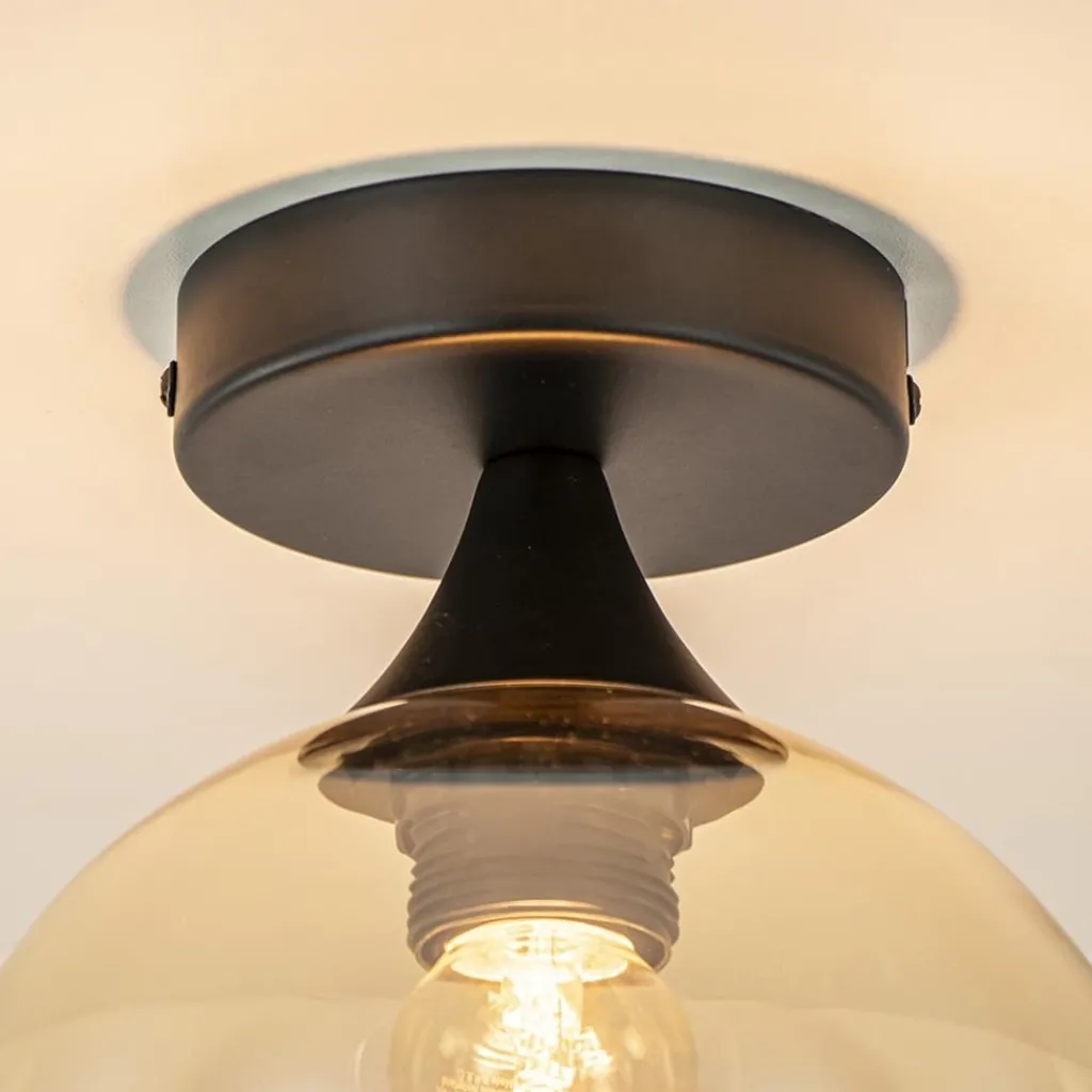 Straluma Kleine plafondlamp zwart met amber glazen bol> Plafondlampen|Klassieke Verlichting